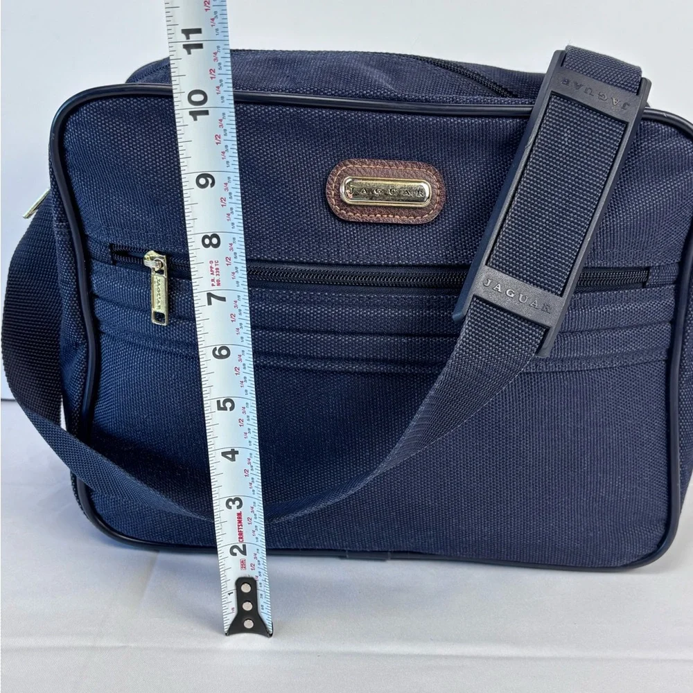 Jaguar Blue Travel Bag with Durable Fabric and Leather Accents. Nice Condition!